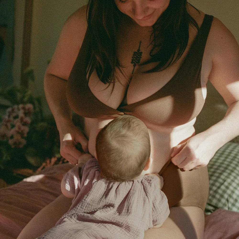 Kailey wearing the Cleo Crossover Bra in Earth
